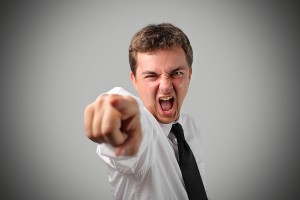 bigstock-Angry-businessman-accusing-som-12162596